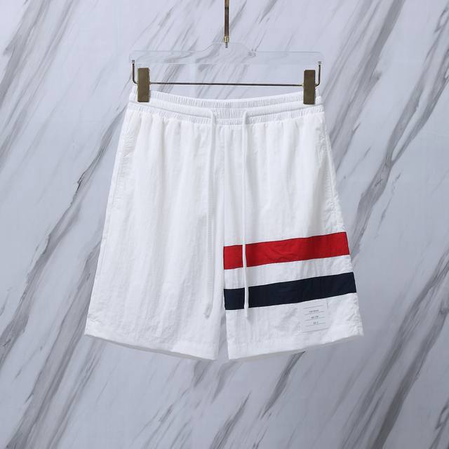 Article number: F32 Tb beach pants red, white and blue ribbon shorts Large amoun