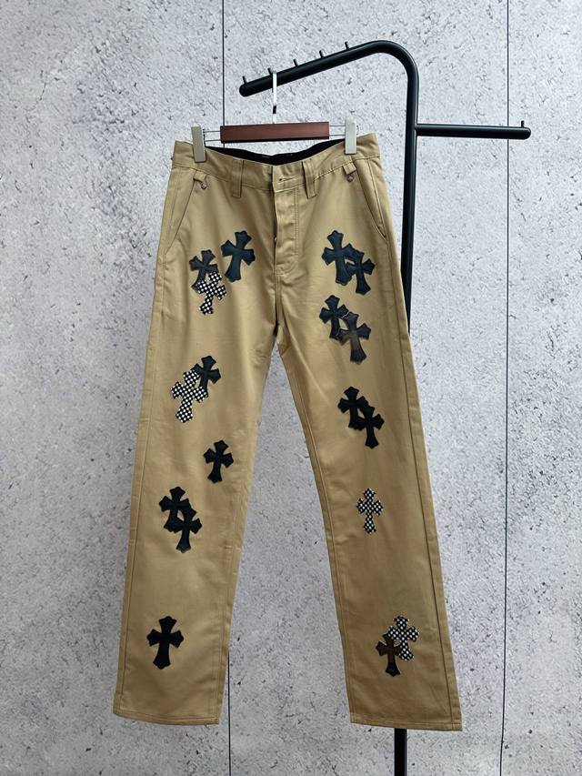 Khaki overalls with black cross leather decoration, the style is more American h