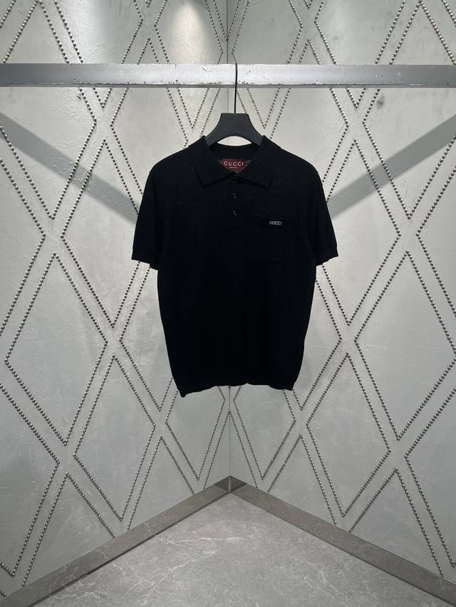 The chest pocket of the new fine wool knit Polo top from G.M.A. is decorated wit