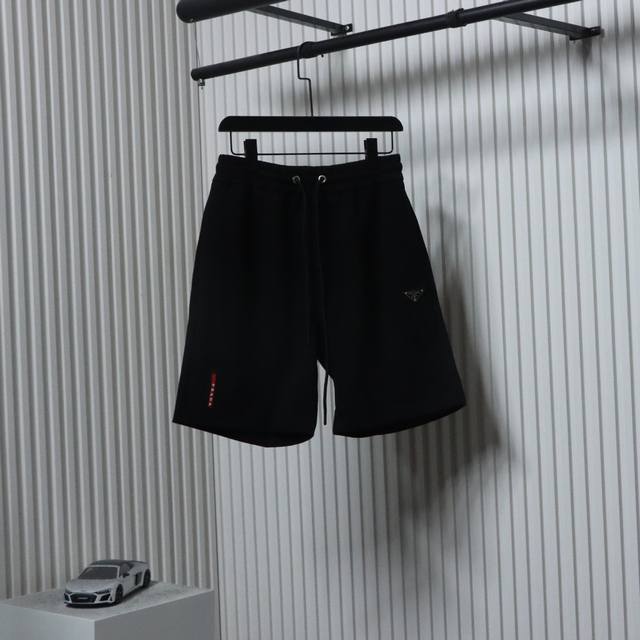Prada 25Ss metal triangle logo red rubber strip logo shorts for men and women, n