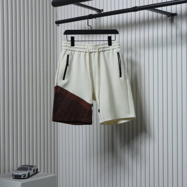 Fendi 25Ss laminated zipper pockets with double F woven shorts. The custom fabri
