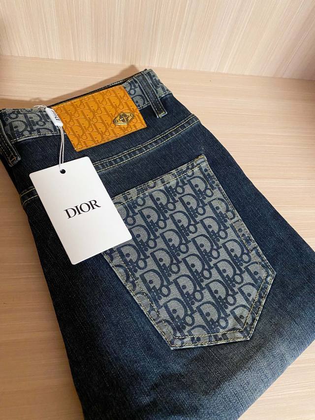 Dior dark effect jeans. Design details: five pockets, signature logo embroidery