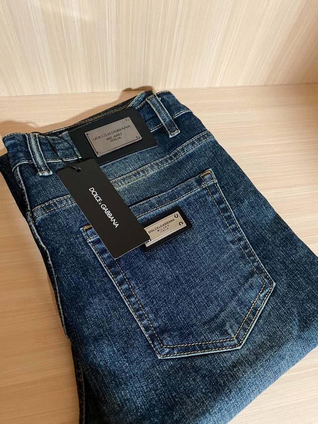 Dg Denim trousers with brand logo on back pocket, suitable for daily life. All t