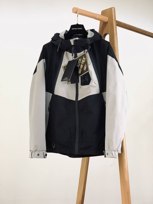 Arcteryx Contrast Color Zipper Hooded Windbreaker Jacket! The fabric and style a