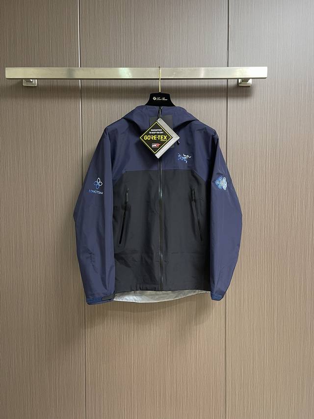 Arcteryx x Songzan joint series outdoor waterproof hard shell hooded jacket. Unl