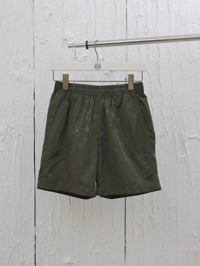 Lv Louis 25Ss full print ultrasonic embossed dark pattern beach shorts The overa
