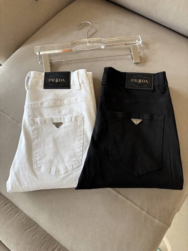A pair of super stylish jeans from Prada, custom-made original washed denim fabr