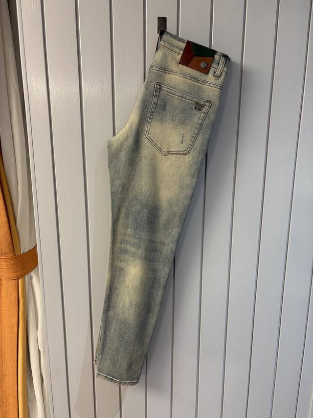 A pair of super stylish jeans from Loewe, custom-made original washed denim fabr