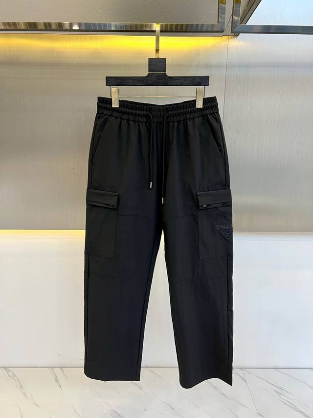 Prada high street functional style paratrooper overalls pleated straight pants.