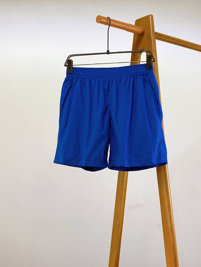 Louisvuitton Monogram Beach Shorts The pants are embossed with Monogram Constell