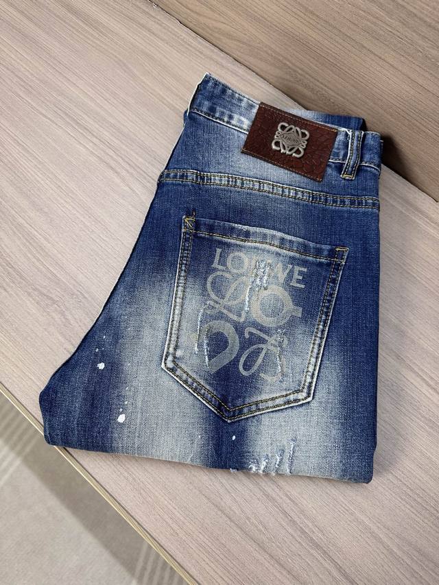 Low Loewe 25Ss new spring and summer jeans with white patches and holes, back po