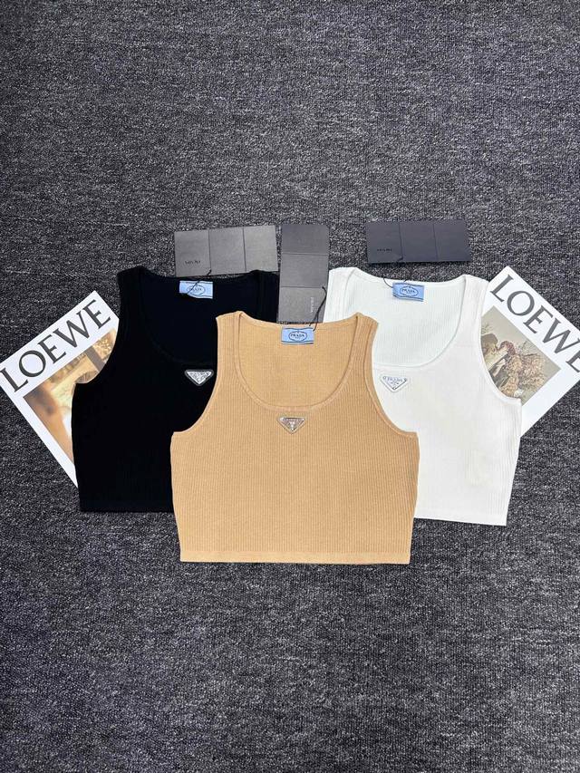 The Prada short vest is a new fashion favorite. It is simple yet stylish. The tr