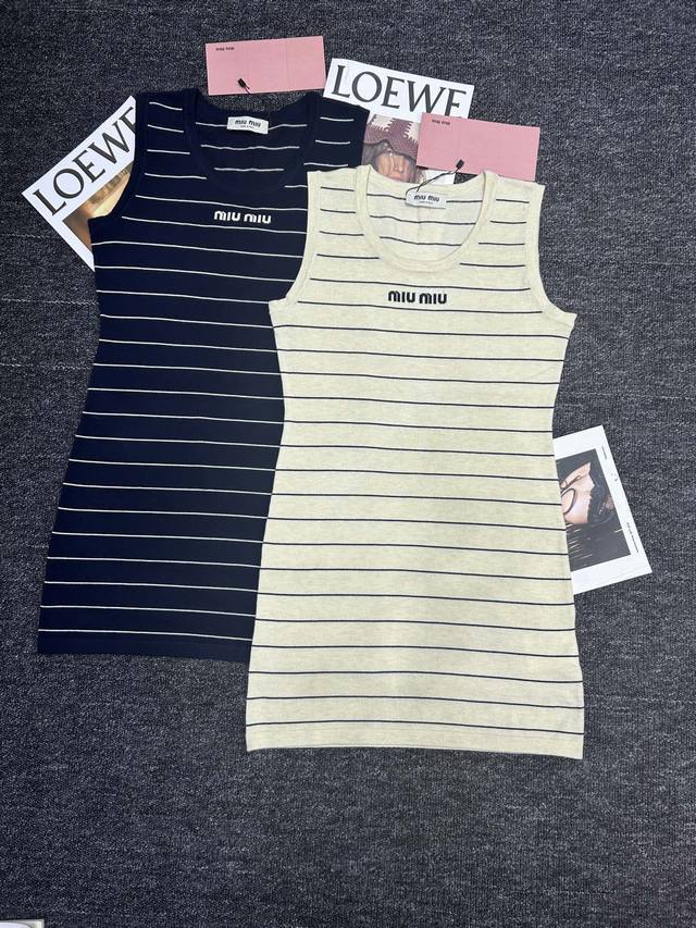 Miumiu striped vest dress, showing the perfect combination of elegance and vital