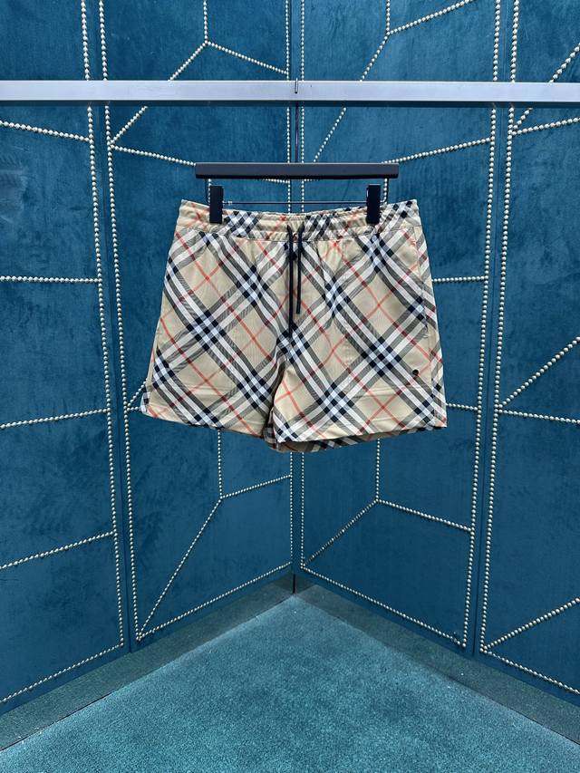 Burberry 25Ss new drawstring swim trunks in nylon twill. Woven in Italy with Bur