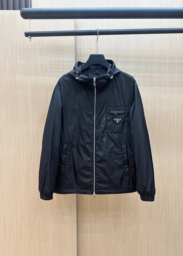Prada early spring 2025 latest fashion designer jacket. Every detail shows the c