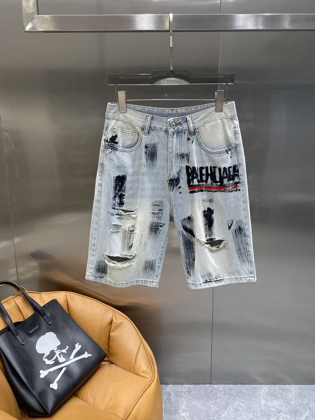 Balenciaga Balenciaga denim shorts, trendy and distressed with ripped holes and