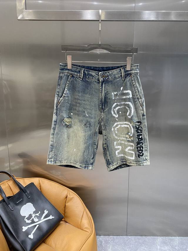 D2 D2 denim shorts, trendy and distressed with graffiti letters, full of street