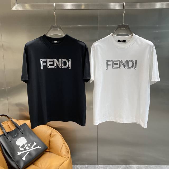 Fendi short sleeves are a must-have for summer luxury. The word "Fendi" is prese