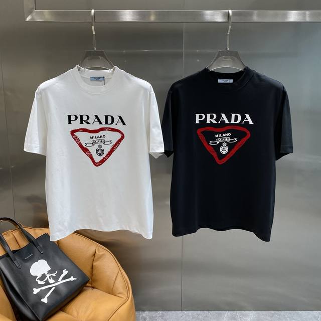 Prada is a new benchmark for summer fashion and luxury. The black body is classi