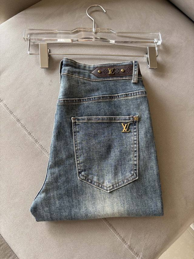 A pair of jeans with a very stylish look, custom-made original washed denim fabr