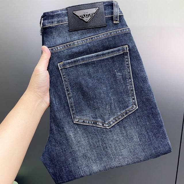 Prada's newest jeans for spring 2025. No pressure to enter or leave the store. H