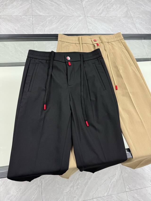 Kiton minimalist business casual trousers.