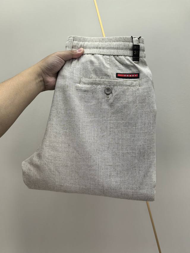 Prada. The latest men's cotton and linen trousers for spring and summer 2025! Te