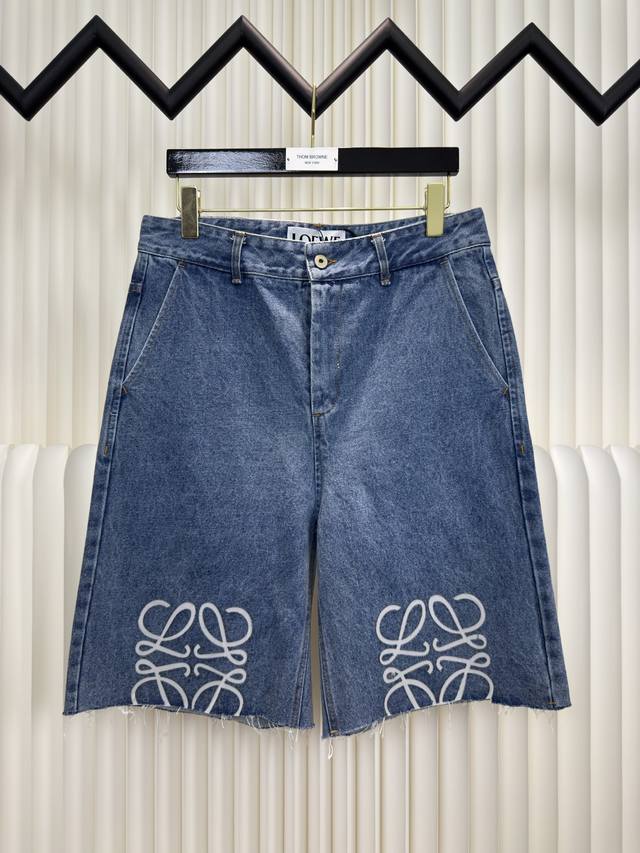 Loewe laser burnt patch distressed jeans This version is lighter in color uses 7