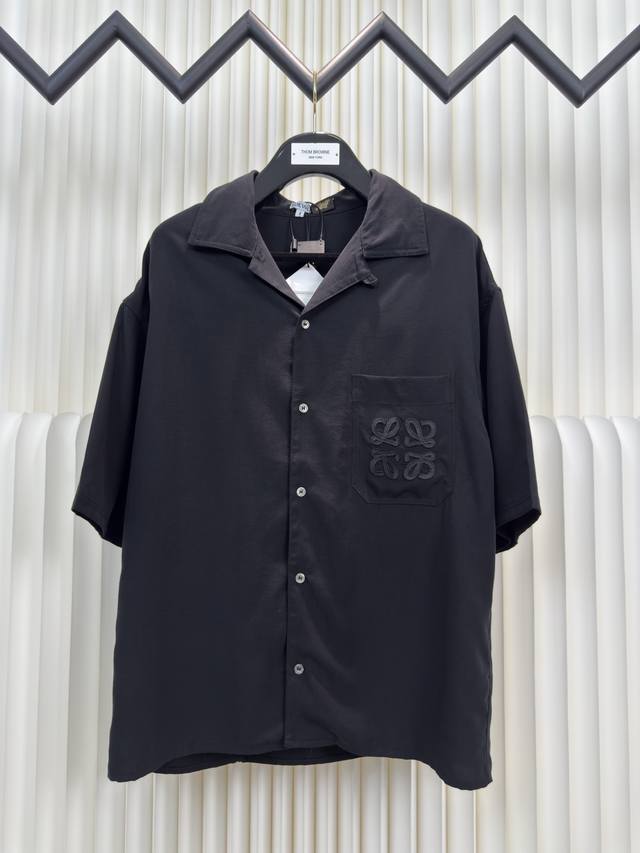 Loewe embroidered silk shirt is made of 98% silk and 2% cotton. The fabric is ma