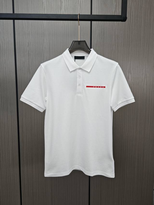 Prada. Classic Polo shirts are available at the counters at the same time as Pd'
