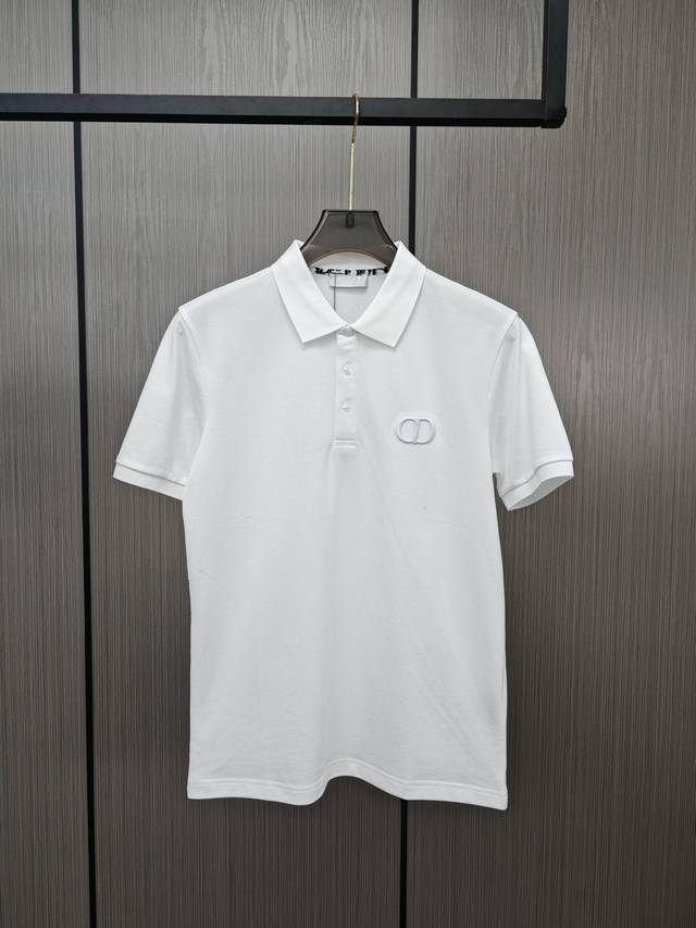 Dior* Dior. Embroidered classic Polo shirts are available at the counter at the