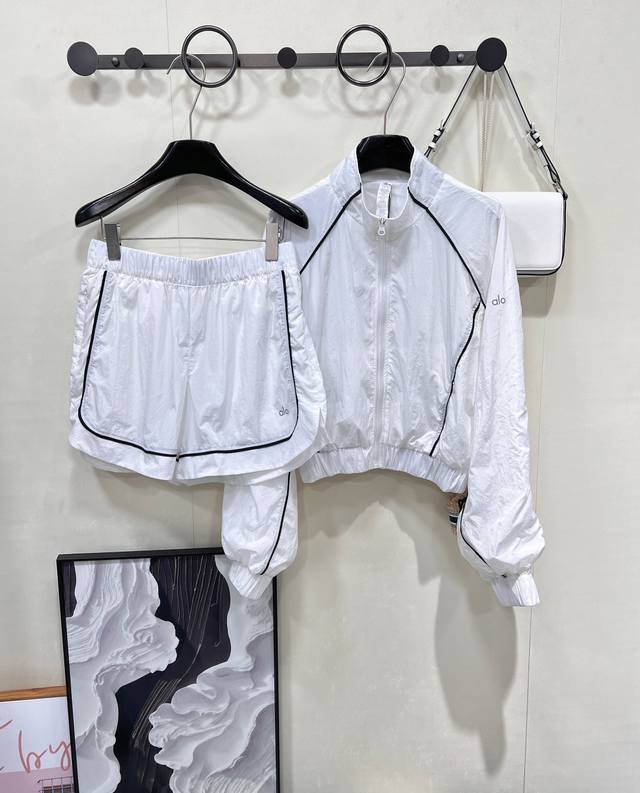 Alo's new ultra-thin sunscreen short jacket and shorts set. The fabric is as lig