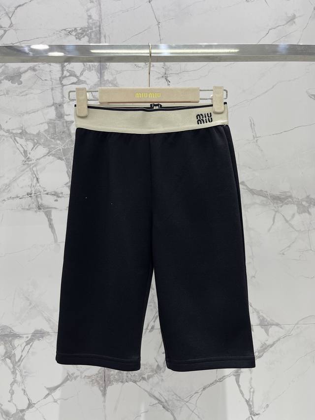 Miu Miu's new elastic waist rhinestone letter five-point cycling pants . The des
