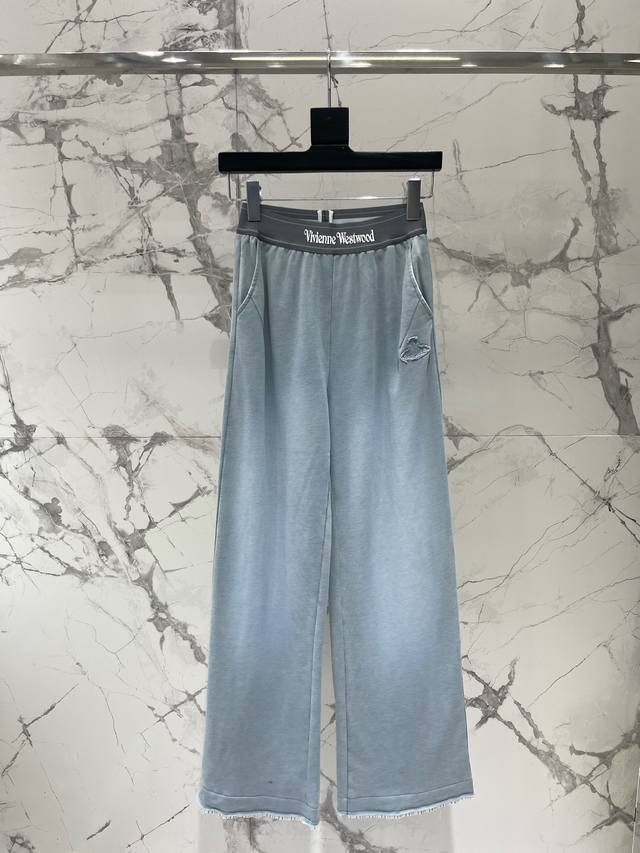 Vivienne Westwood's Saturn Letter elastic waist curled striped trouser legs stra