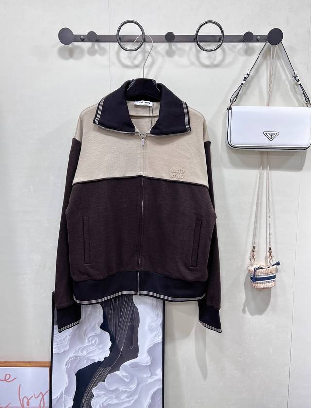 Miumiu's new letter patch stitching zipper jacket. This Miu Miu jacket welds hig