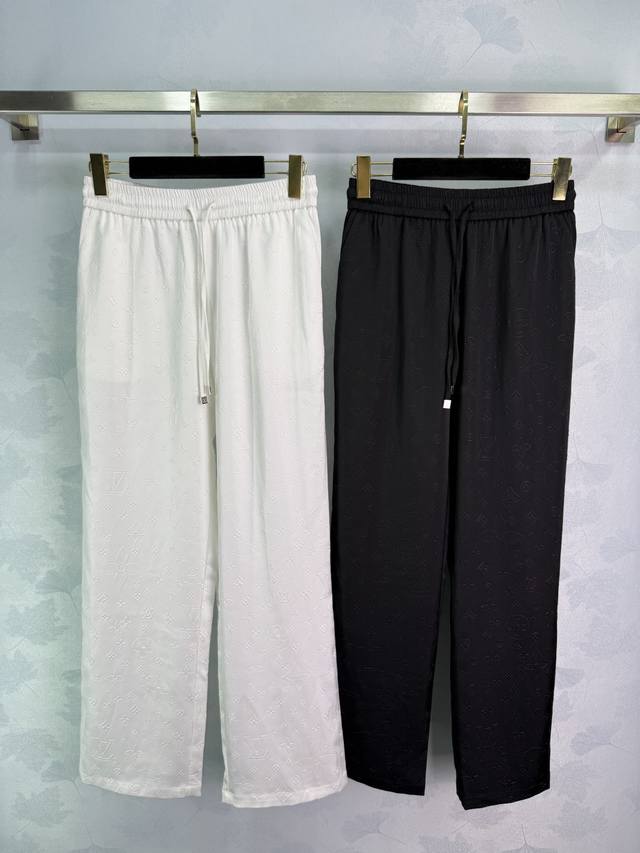Lou full-print logo casual pants, available in black and white, the fabric is ad