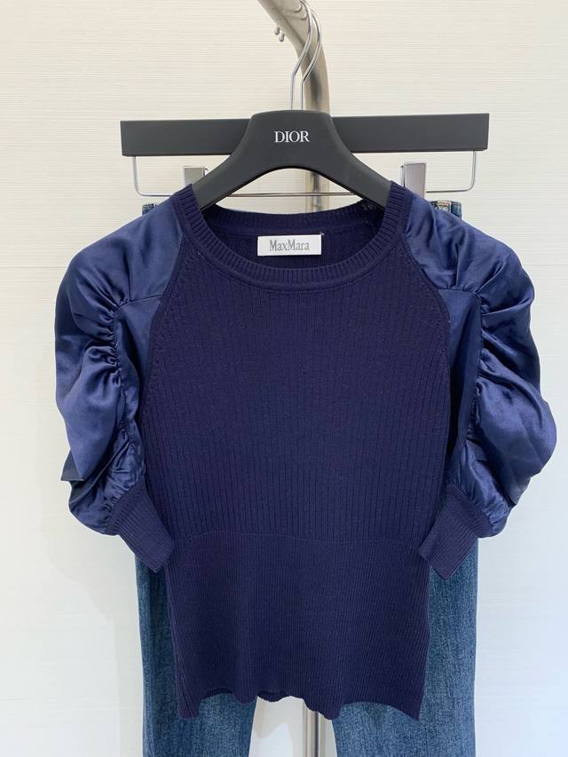 Synchronized new style puff sleeve patchwork sweater. The patchwork design of di