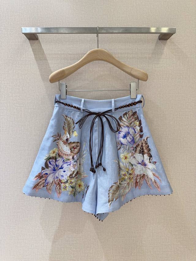 Zimmerma*N*N New Pleated Shorts This blue and colorful pleated shorts, is made o