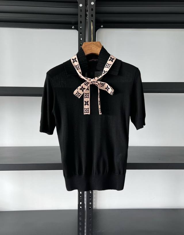 New for the season, Donkey Knit Top with Pleated Collar Crafted from a delicate
