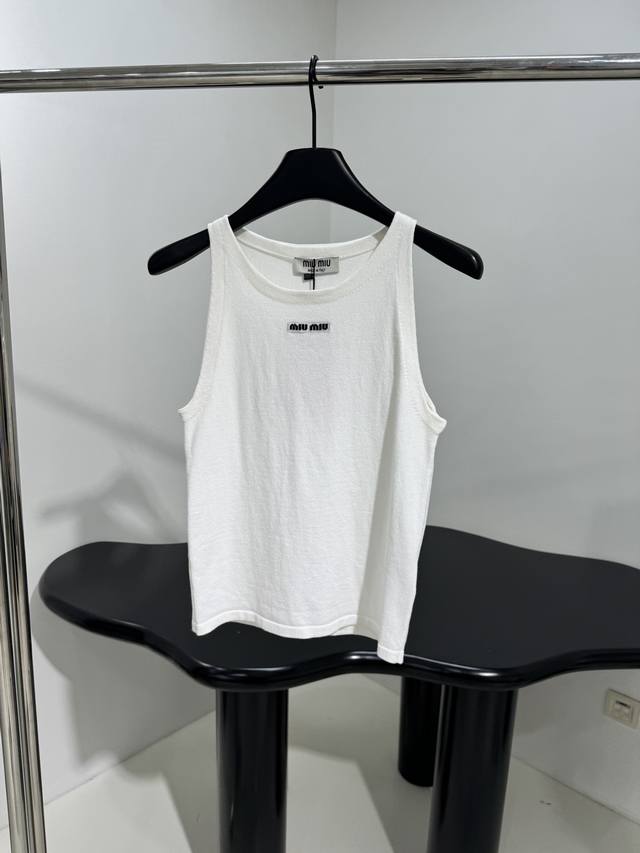 New wool vest Made of white wool fabric Decorated with brand logo embroidery Ela