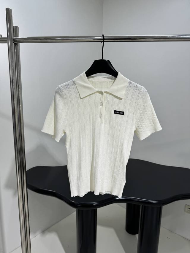 New cotton polo shirt Made of off-white cotton fabric Embroidered with brand log