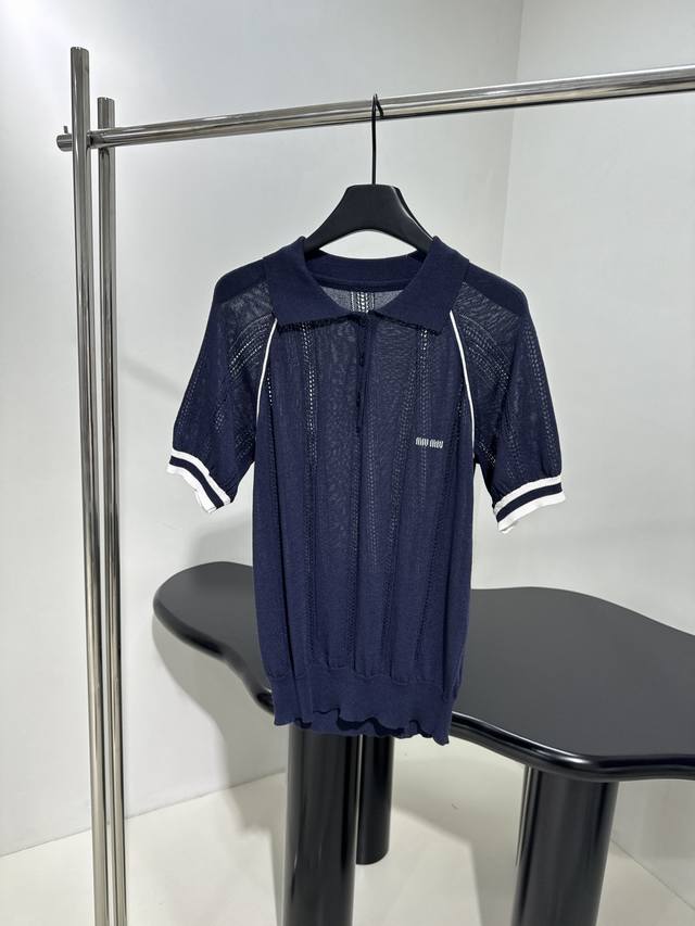 New wool blend polo shirt Made from navy blue wool blend fabric Embroidered with