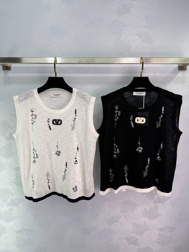 Valentino* Chanel style embroidered vest is available in black and white. The wh
