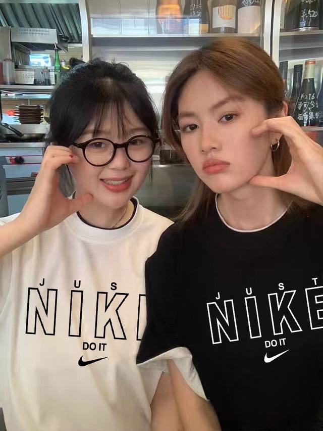 A371# Nike's new hollow letter series printed couple short-sleeved shirt is made