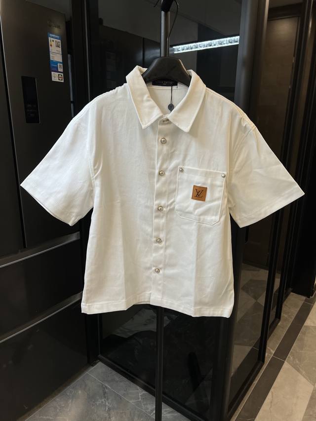 The next day 1V Louis 25Fw Donkey's chest leather label denim pearl button short