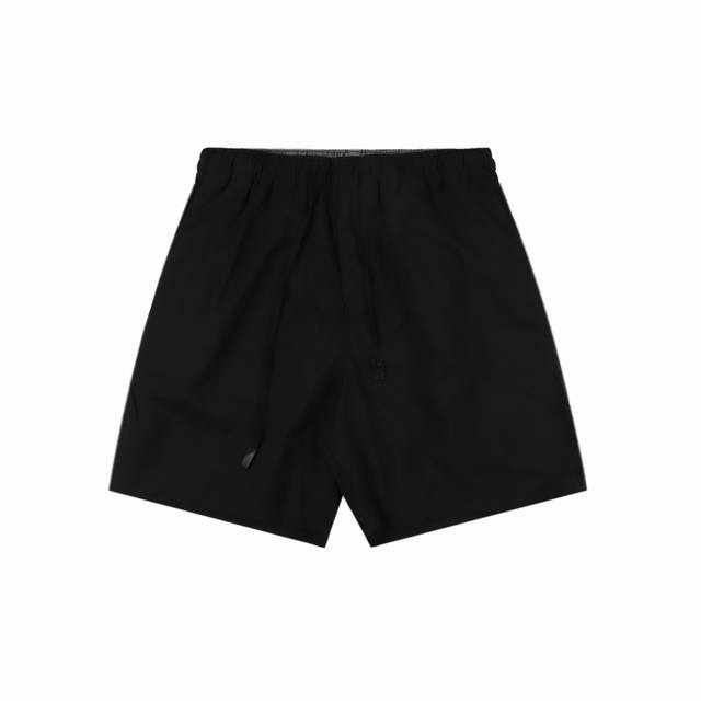 Loewe Back Pocket Hollow Embroidery Shorts is made of 32% nylon and 68% cotton b