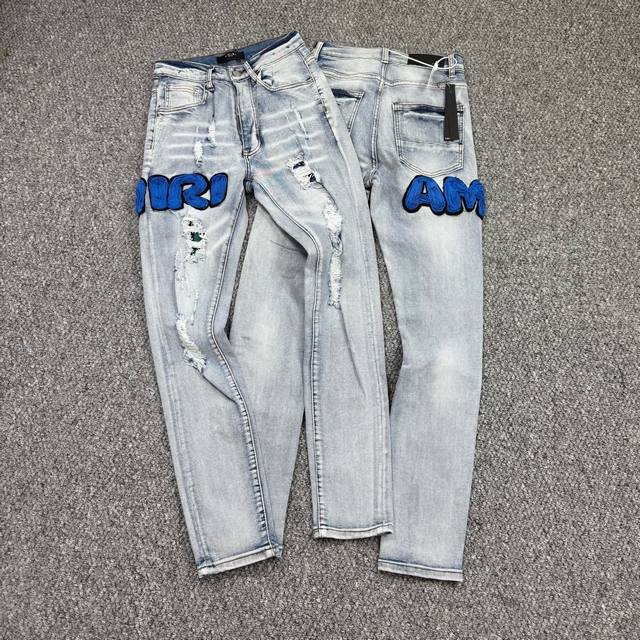 Style number: H865 Amiri & Amiri new jeans embroidered logo washed ripped patte