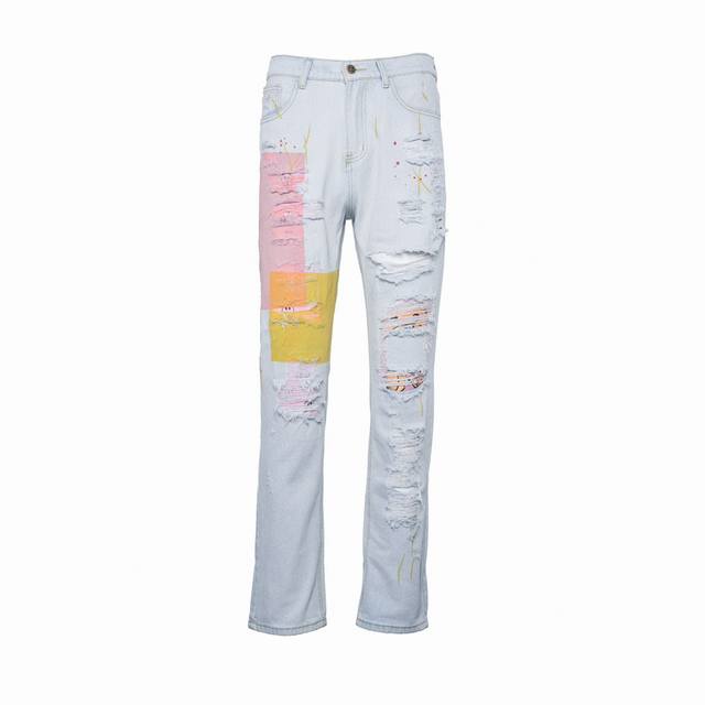 Drew House smiley face with multiple holes in ice blue washed straight jeans Dre