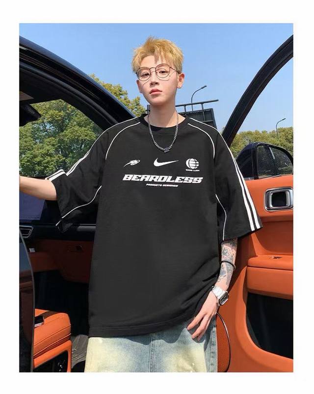for Nike's new hollow letter series printed round neck couple short sleeves use