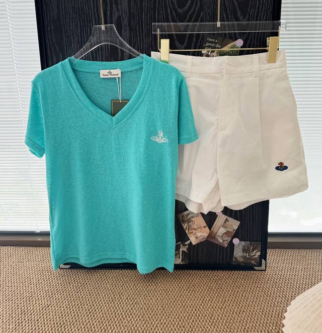 Price: Product name: * Queen Mother Saturn embroidery Tiffany blue V-neck short